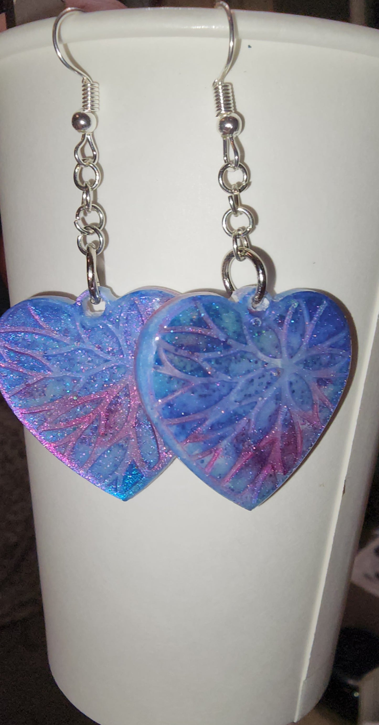 Handcrafted Shimmering heart-shaped eearrings.