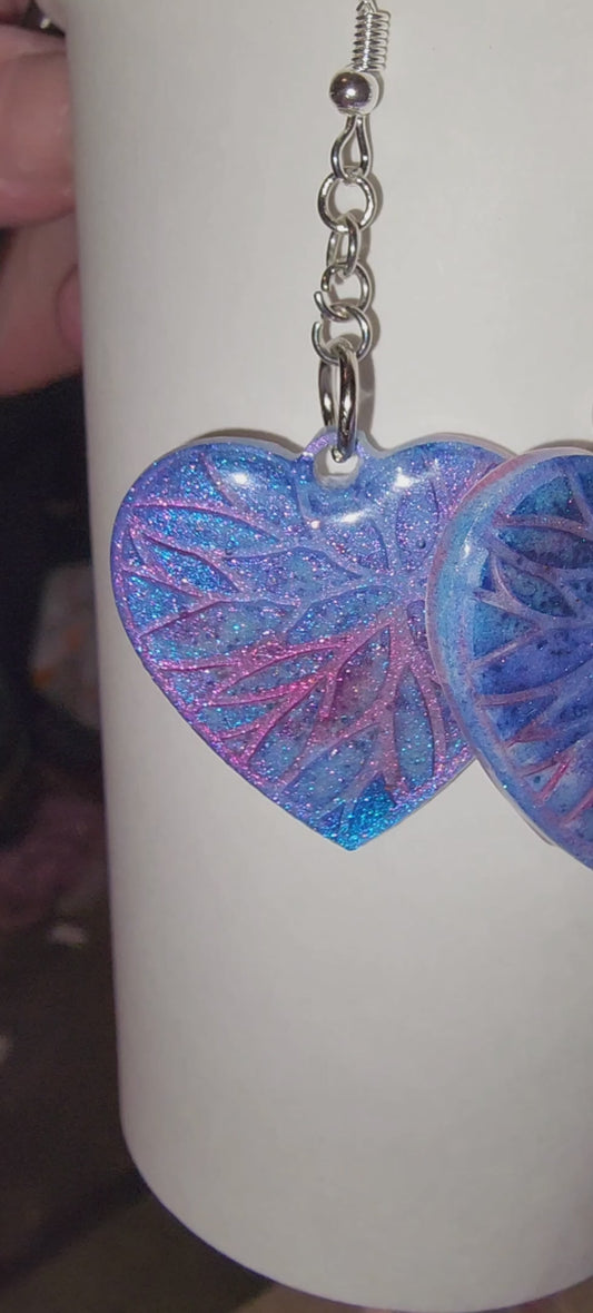 Handcrafted Shimmering heart-shaped eearrings.